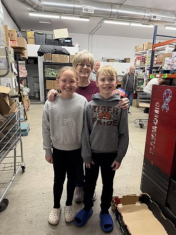 Tyler Wilson, left, and Silas Stredwick, fourth graders at Columbia Ridge Elementary, visited the Ephrata Food Bank Thursday to present a $471 donation on behalf of their school. The funds were raised by the Columbia Ridge Associated Student Body through their “Caps for a Cause” and “Stuffies for a Cause” fundraisers. Through these events, students were invited to wear hats - “caps” - or bring a stuffed animal to school in exchange for a $1 donation. Students and staff generously contributed to the effort.