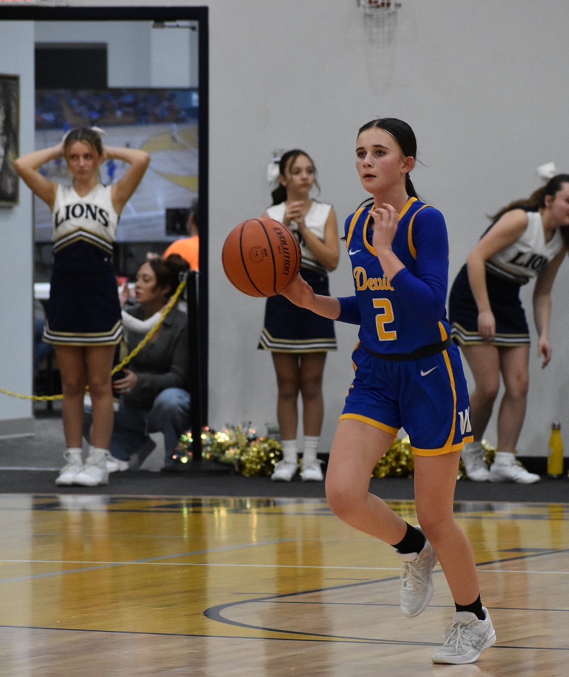 Wilson Creek sophomore Kaydence Leslie runs toward the hoop during a game against MLCA/CCS earlier in the season. Leslie shot four three-pointers and led the Devils offensively with a total of 23 points scored Saturday.