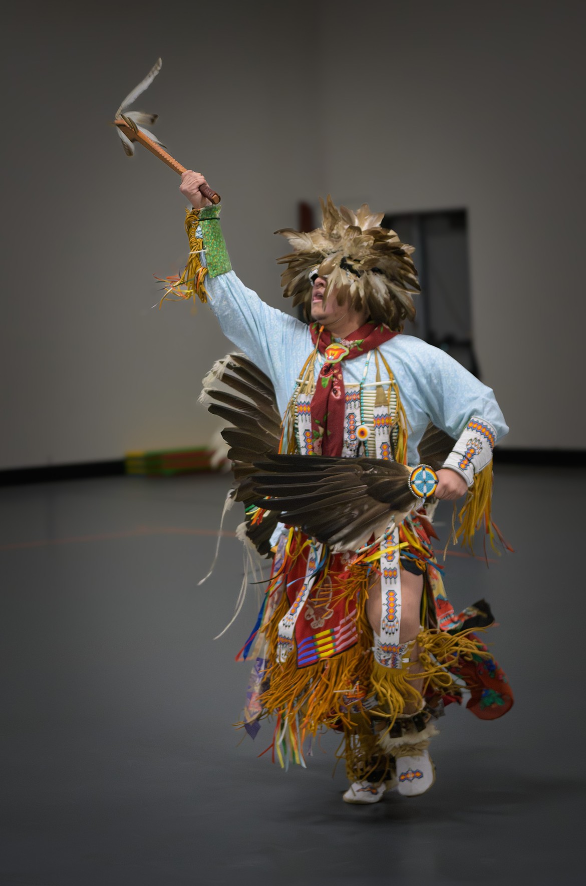 Iggy Quequesah a member of the Ronan Native Dancers performs an ancient Native American War Dance during a presentation in Plains. (Tracy Scott/Valley Press)