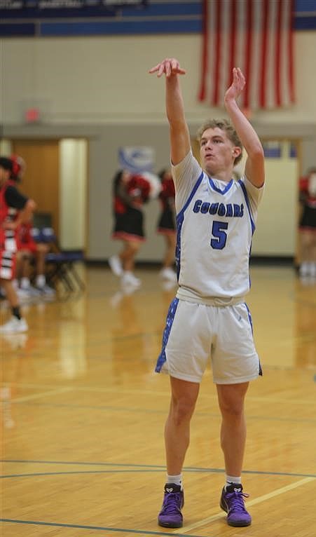 Warden senior Eli Cox sinks a free throw.
