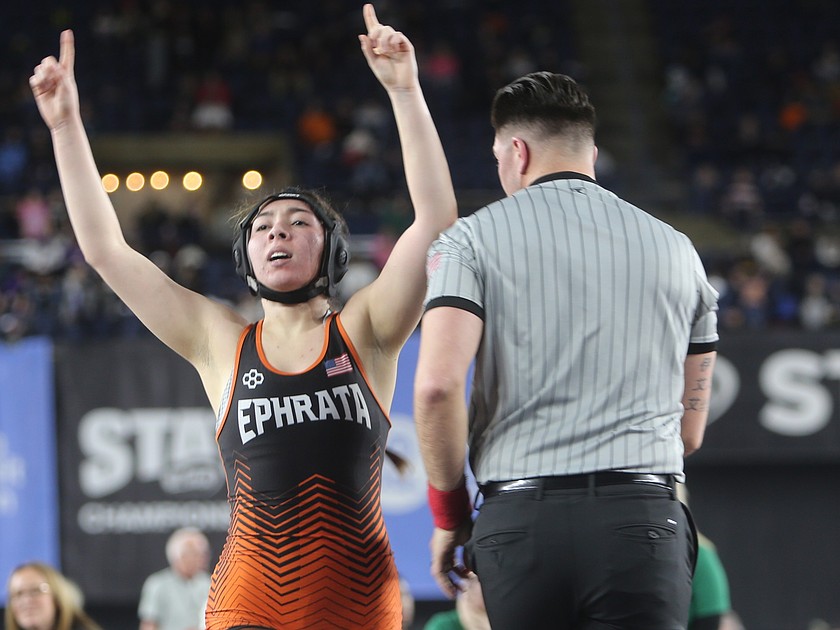 Adylene Sanchez celebrates winning her second state championship as a Tiger Saturday. Sanchez is the first girls wrestler to become a two-time state champion in Tigers history.