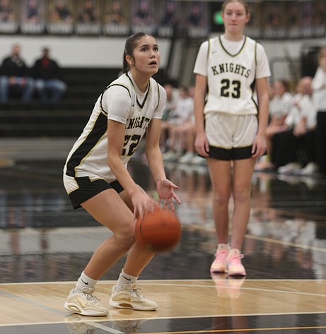 Knights junior Graycie Kast gets ready to shoot a free throw earlier this season. Kast led the team with 15 points scored during the district championship game against Zillah.