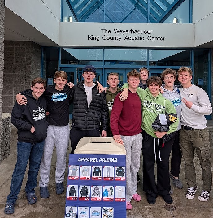 From left: Mavs athletes Conner Fear, James Center, Matt Molitor, Lennox Leeder, Sam O’Shea, Charlie Rippy, Ledger Archer, Luca Cristoloveanu and Sam Molitor stand together outside the King County Aquatic Center ahead of the state competition.
