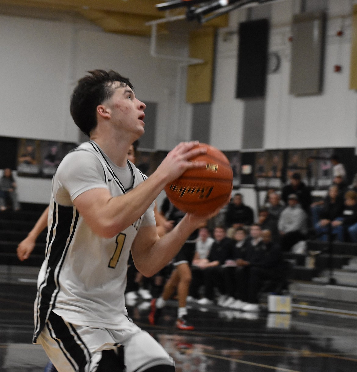 Knights junior Fischer Livingston gets ready to make a shot in a previous district matchup this postseason.