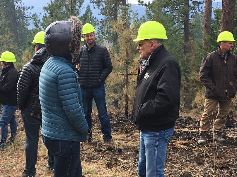 Rep. Tom Dent, forefront in blue jeans, has proposed Hosue Bill 2104 to secure aviation funding for aerial wildfire support. It's been approved by the House and Dent hopes it will work its way into law. Dent serves the 13th Legislative District and is based in Moses Lake.