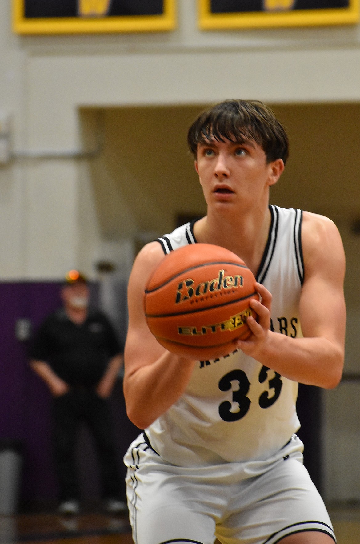 Tucker Bayless, a senior from ACH, locks in on the net during a free throw against Neah Bay Saturday afternoon.