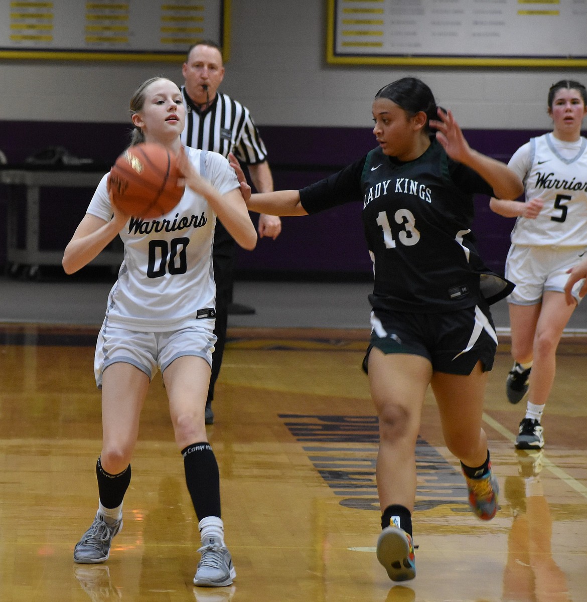 ACH senior Emily Evers passes the ball over to an open teammate in the second round of the state tournament against Muckleshoot.