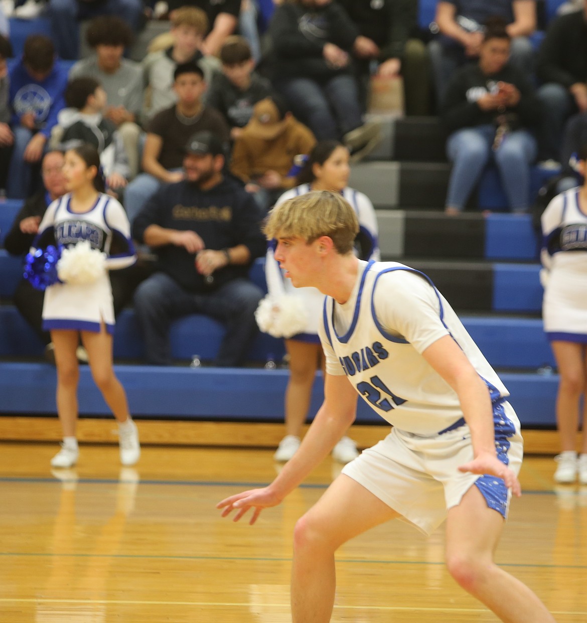 Warden senior Hunter Golladay gets ready on defense to try and stop his opponent’s push toward the net during a previous game this season.