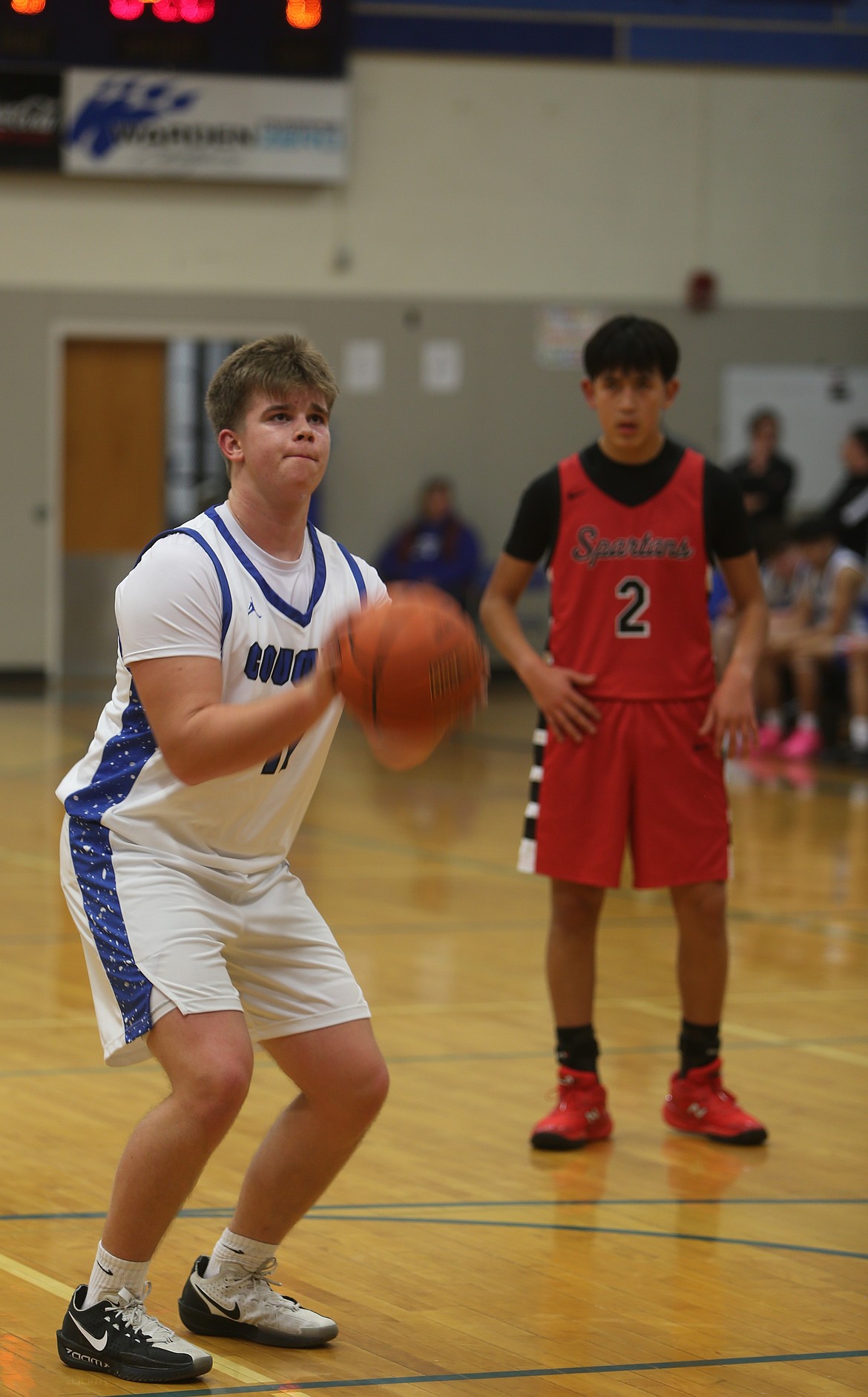 Cougars junior Kameron Jenson makes a free throw during a previous matchup this season.