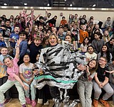 Duct Tape Caper: Attendance incentive sticks Polson principal to the wall