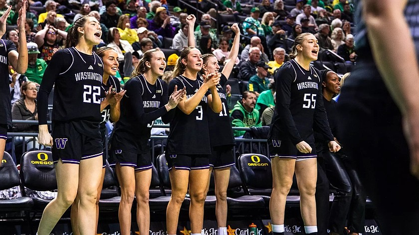 Huskies players cheer from the sideline following their road victory over the University of Oregon. UW prepares for their first game of the postseason Thursday morning.