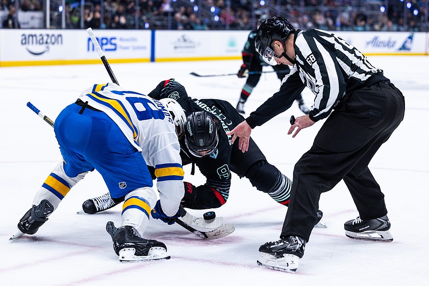 St. Louis Blues center Robert Thomas (18) faces off against Seattle Kraken center Chandler Stephenson (9) during the third period of an NHL hockey game Wednesday, March 4, 2026, in Seattle.