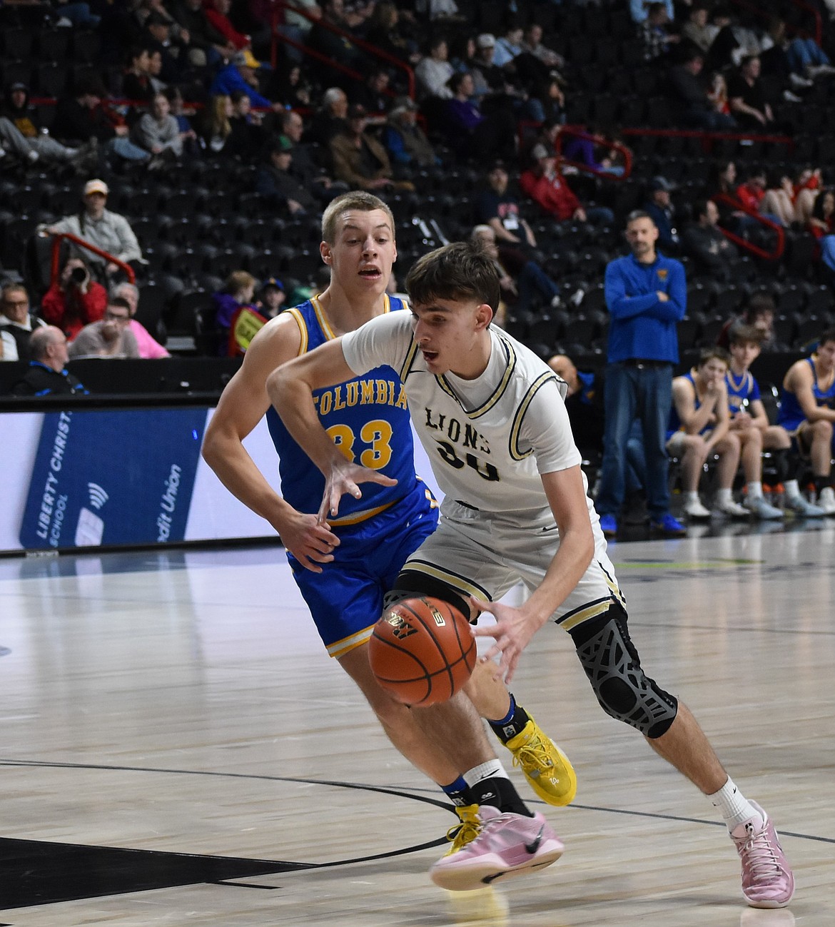 MLCA/CCS freshman Roman Gulenko makes his way past a Columbia Adventist defender as he works toward the net.
