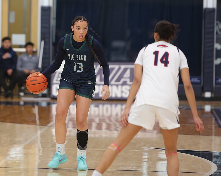 Kaliyah Evans (13) sizes up her opponent from Clackamas Saturday. The Big Bend Community College Vikings were defeated by Clackamas Saturday 74-55.