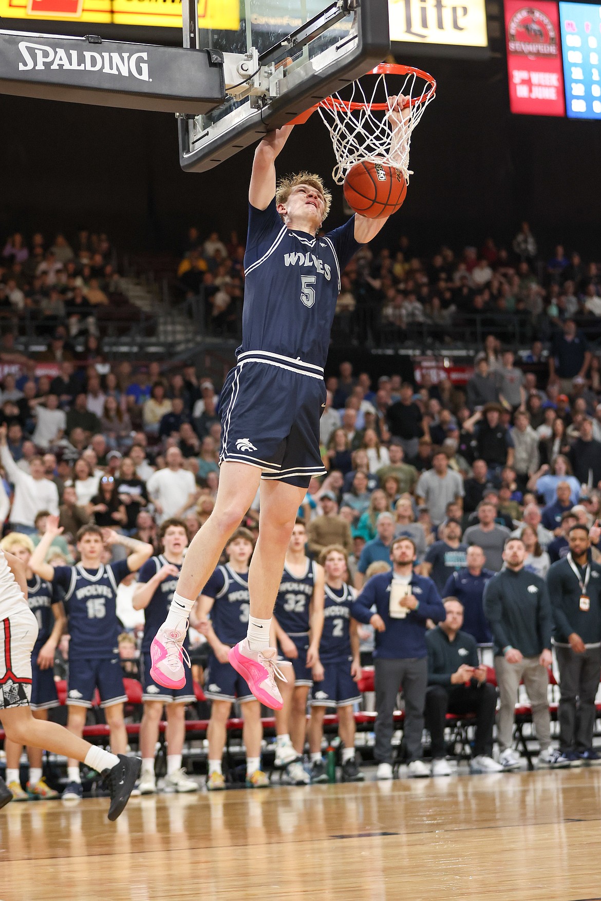 JASON DUCHOW PHOTOGRAPHY
Lake City junior Jordan Carlson dunks as part of a personal 7-0 run early in the fourth quarter against Owyhee of Meridian in the state 6A boys basketball championship game Saturday night at the Ford Idaho Center in Nampa.