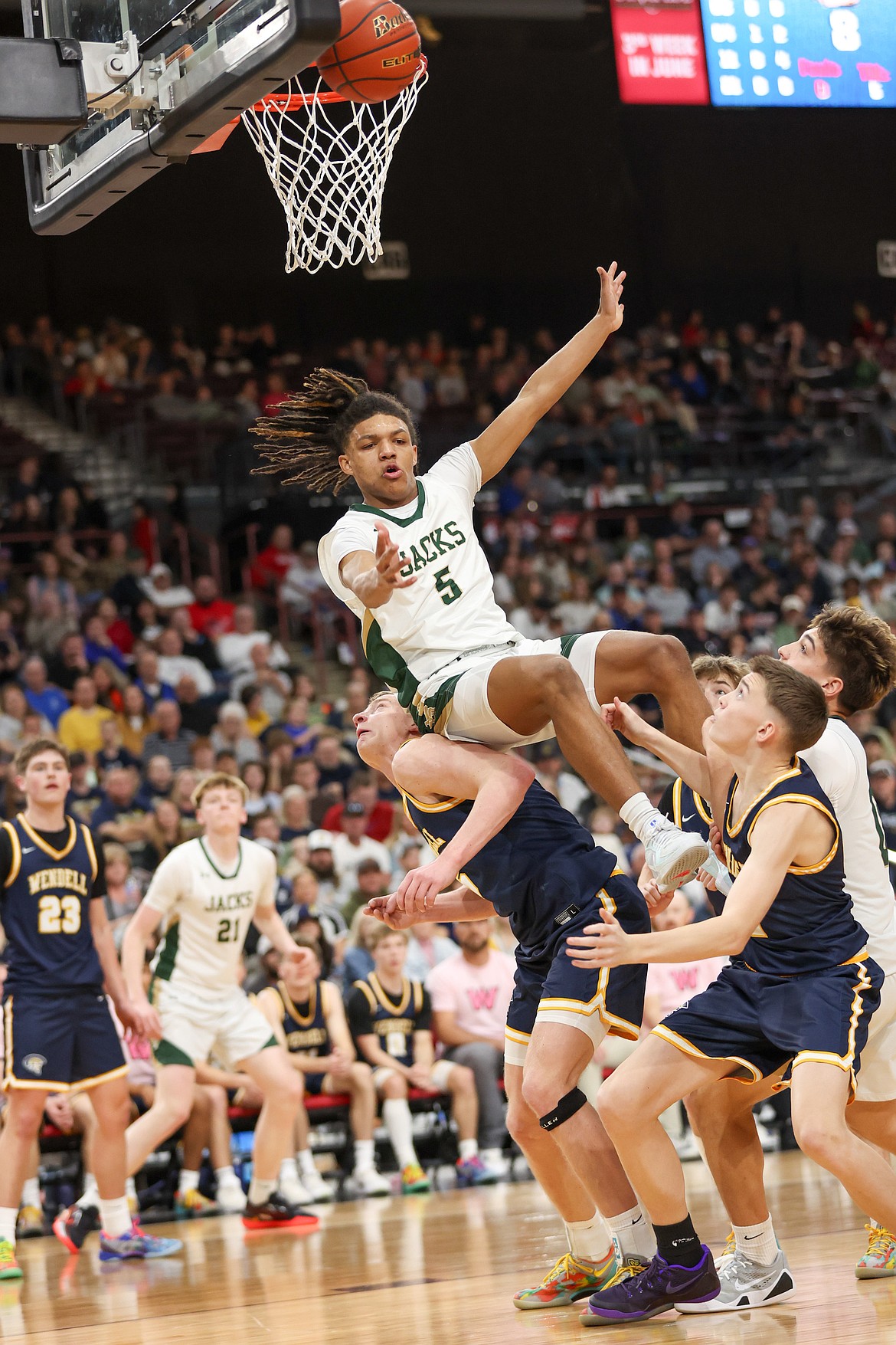 JASON DUCHOW PHOTOGRAPHY
St. Maries senior Isaiah Gustaffe (5) soars for a rebound attempt against Wendell in the state 3A championship game Saturday at the Ford Idaho Center in Nampa.