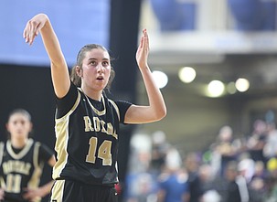 Lauren Wardenaar (14) shoots a free throw against King’s during their semifinal game in the 1A state tournament. The Knights made their first state tournament appearance since 2001 and finished with a 23-5 record.