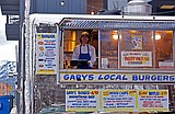 Food trucks serve local burgers at a bargain price