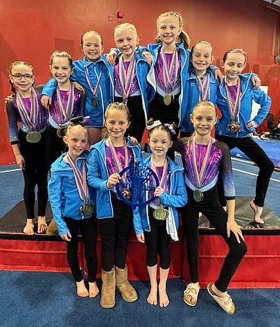 Courtesy photo
GEMS Athletic Center Bronze Team placed 1st overall at the Free to Flip gymnastics competition March 7-8 in Moses Lake, Wash. In the front row from left are Harlee Wynand, Ava Puyleart, Brynlee Smith and Abigail Denisyuk; and back row from left, Olivia Schelin, Astrid McCullough, Payslee Haulet, Millie Ferguson, Paisley King, Chloe Foreman and Kaylene Bilesky.