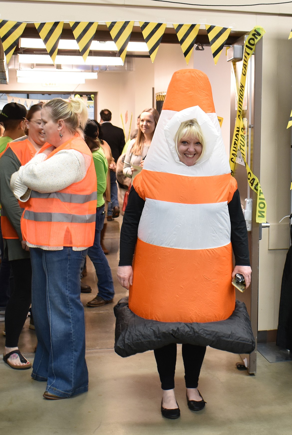 Kar Vanerstrom dressed as a traffic cone in keeping with a construction theme at last year’s Moses Lake Chamber of Commerce Business Expo. The theme this year is “Stars, Stripes and Shamrocks,” a celebrating both America’s 250th birthday and St. Patrick’s Day.