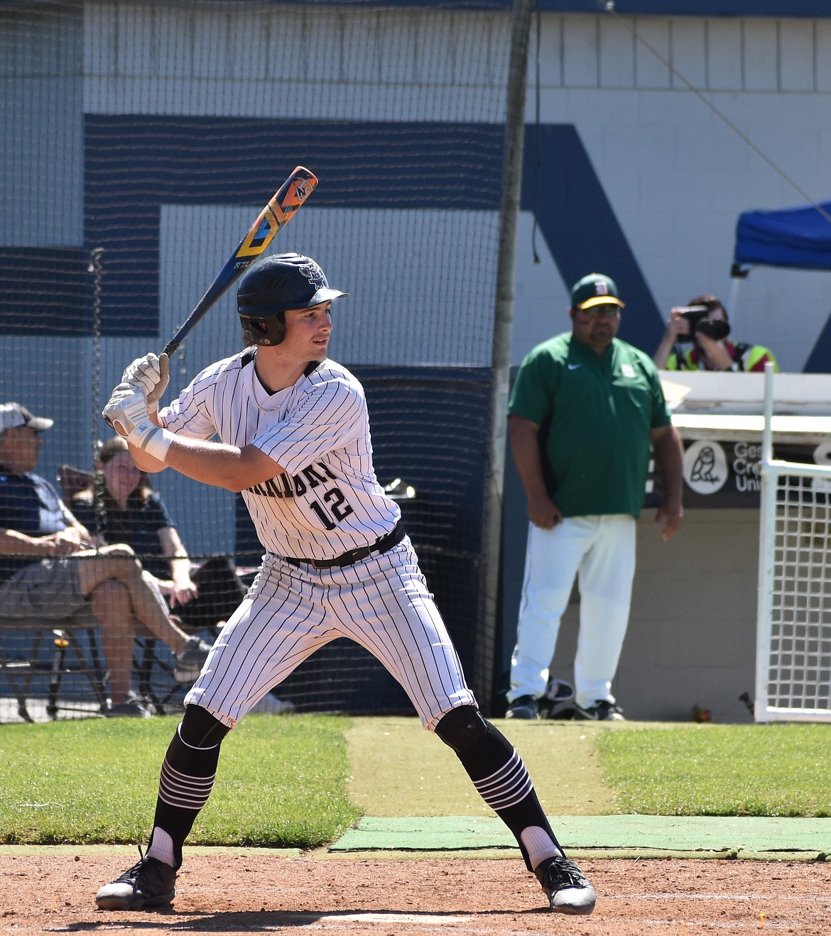 Max Grindy, who is a junior this year with ACH, prepares to take a swing at a pitch last season.