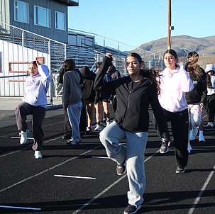 From left, Kena Casteneda, Segura Espindola and Ashya Erazo work on their form during practice.