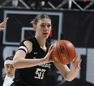 Emma Brummet, a senior for the Warriors makes a pass during the Round of 12 in the 1B state tournament. Brummett won the sportsmanship award at the end of the game.