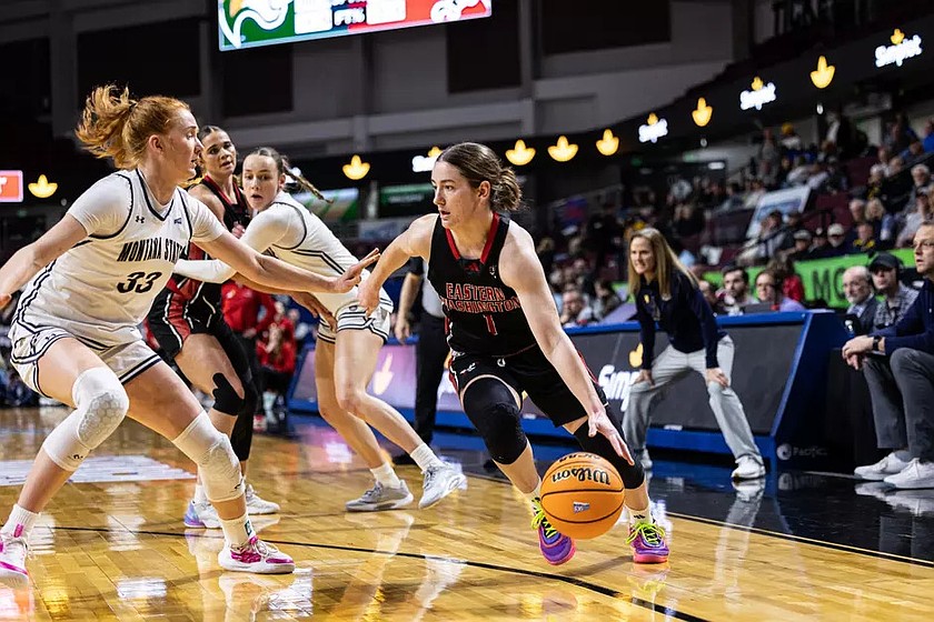 The Eagles’ Elyn Bowers (1) drives toward the basket against a Montana State defender. Eastern Washington’s season came to a heartbreaking end after an overtime loss to the Bobcats.