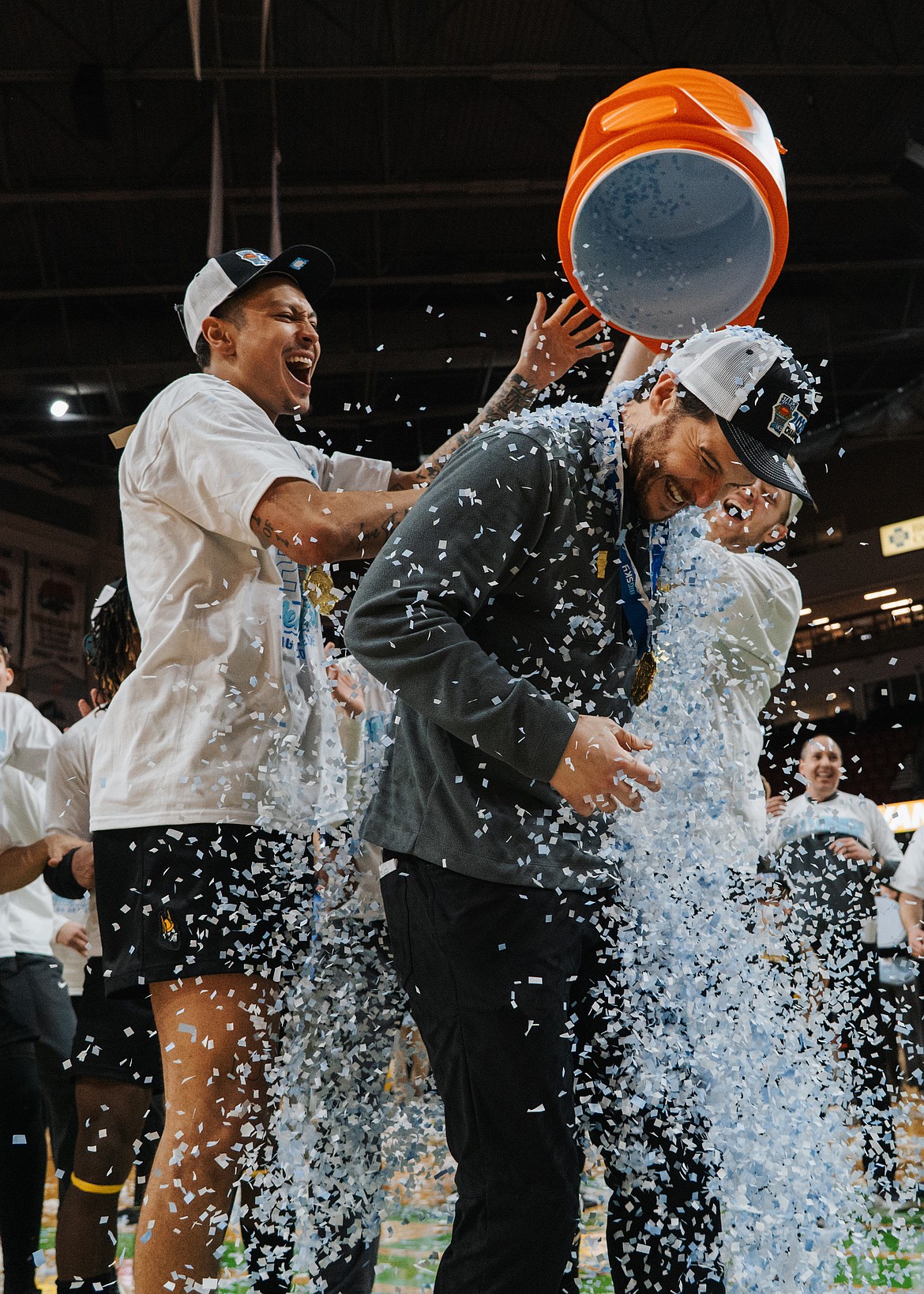 IDAHO ATHLETICS
Idaho men's basketball coach Alex Pribble is doused after the Vandals won the Big Sky Conference tournament Wednesday night in Boise.
