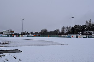 Johnson-O'Brien stadium sits covered in fresh snow Friday morning. Due to snowfall across Washington, sporting events across the Basin have either been delayed or outright canceled this weekend.