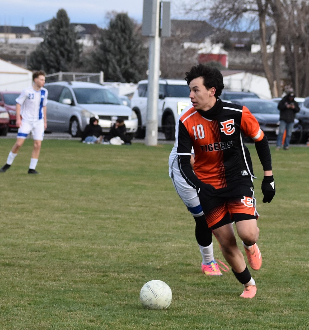Avian Soto, a senior for Ephrata, runs toward the ball while looking to pass to a teammate against Soap Lake.