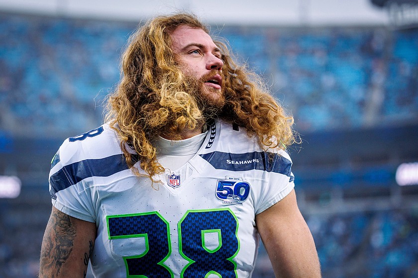 FILE - Seattle Seahawks fullback Brady Russell looks to the stands prior to an NFL football game against the Carolina Panthers, Sunday, Dec. 28, 2025, in Charlotte, N.C.