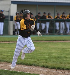 Jeremiah ‘JB’ Olson (22) sprints toward first base. The Moses Lake Mavericks suffered back-to-back losses in a doubleheader against the Kennewick Lions Monday.