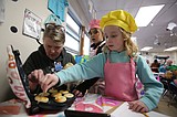 Third graders apply math lessons to baking