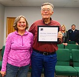 Polson Commission honors retired chief