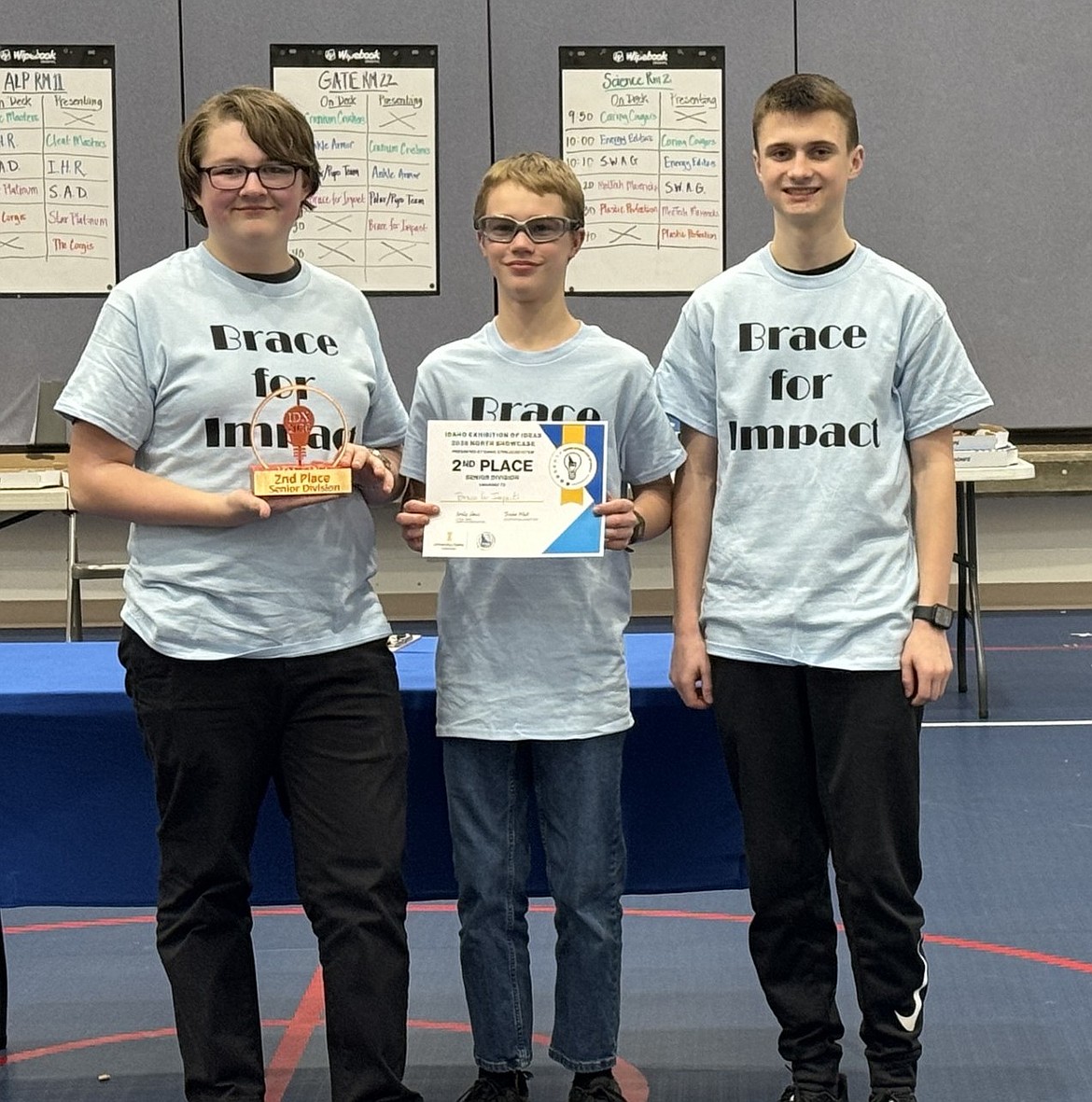 The Timberlake Middle School team came in second in the Senior Division for its Brace for Impact design that allows athletes to be notified if they are placing undue stress on their ACL. From left: Alex Henry, Jeremiah McLachlan and Micah Miller.