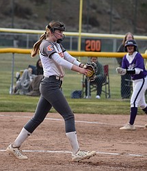 Sidney Chornuk from the Tigers prepares to pitch the ball to the opposing Wenatchee batter during Tuesday’s game.