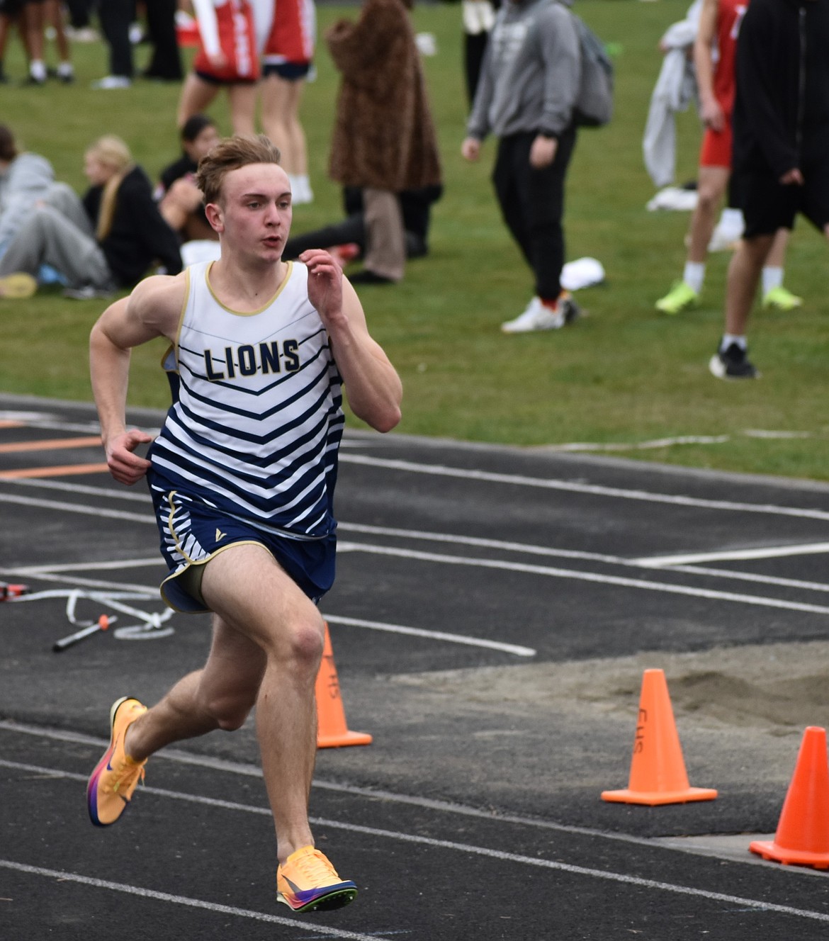 MLCA/CCS’s Ben Bishop runs along the side of the track as he competes against other basin teams in the Ephrata Ice Breaker.