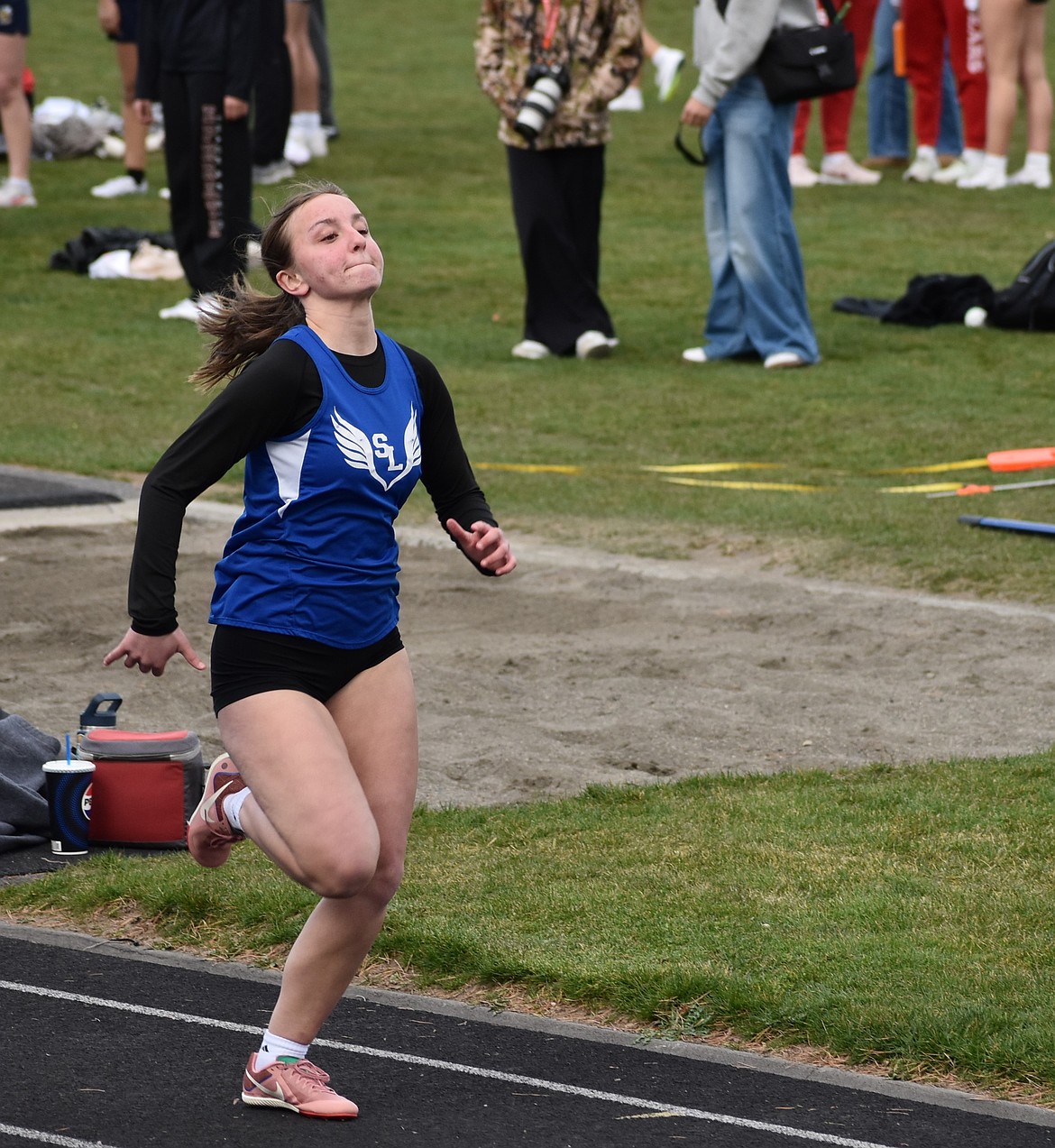 Soap Lake freshman Marina Zubritsky makes a run across the track Tuesday afternoon in the 400m.
