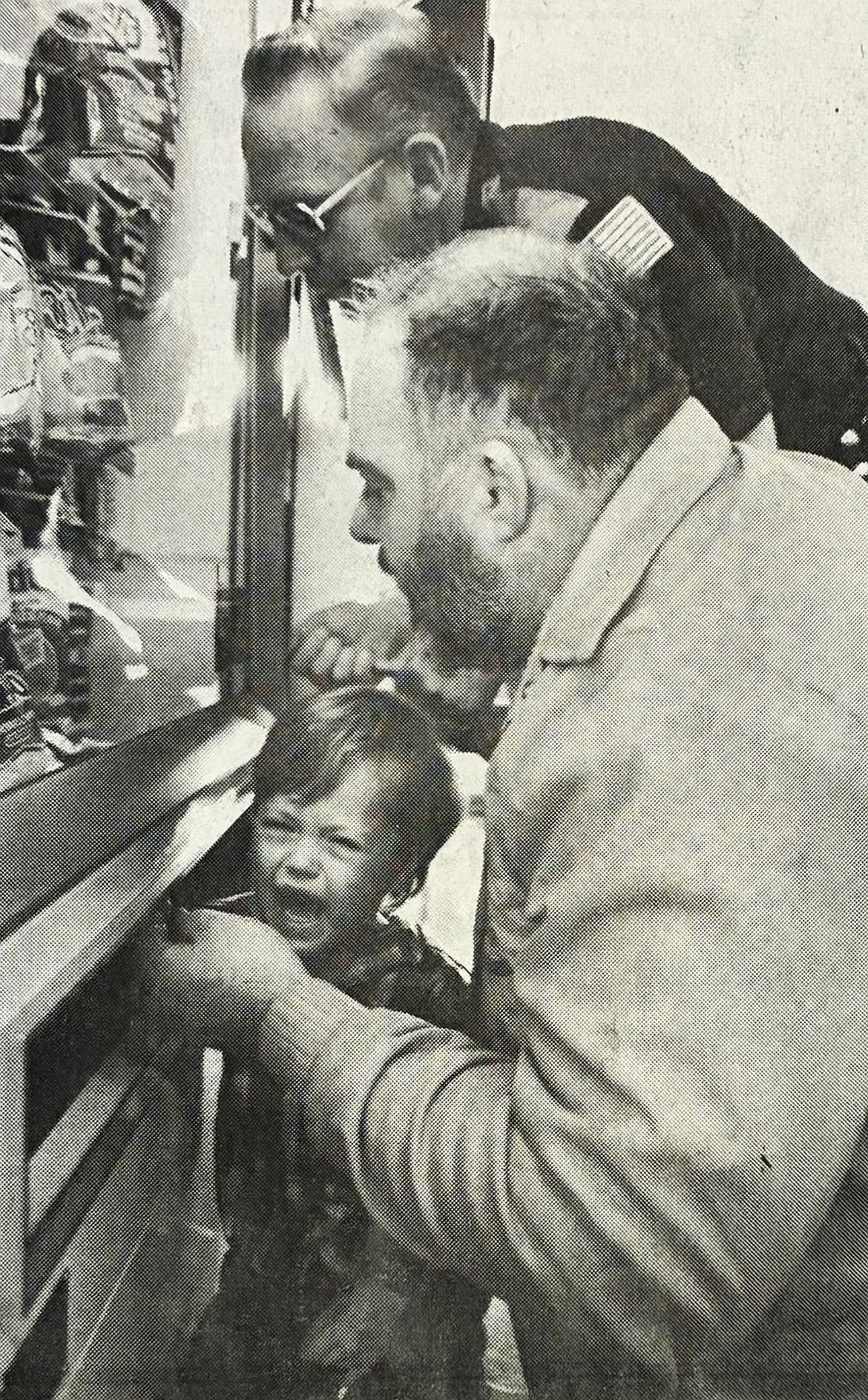 First responders Blaise Koep and Harlan Fritzsche help 5-year-old Michael Richards in 1986.