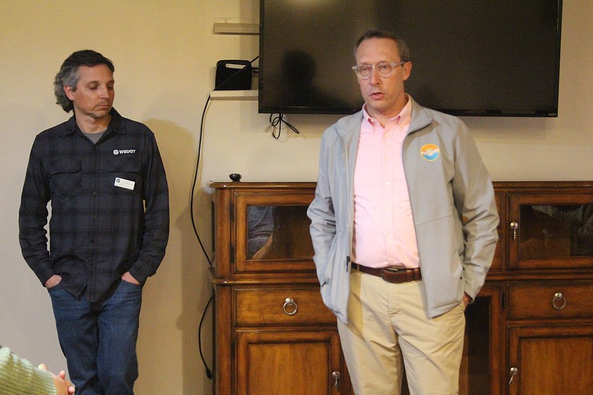 Rob Karlinsey, right, Moses Lake city manager, discusses funding for an initial study of a second Moses Lake crossing. Chris Keifenheim, North Central Region director for the Washington Department of Transportation, is at left.