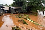 Hawaii’s worst flooding in 20 years threatens dam, prompts evacuations as more rain looms
