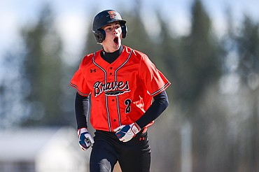 Flathead's Miles Arrowsmith (2) celebrates as he rounds second base after hitting a grand slam in the third inning against East Helena at ABS Park on Thursday, March 26. (Casey Kreider/Daily Inter Lake)