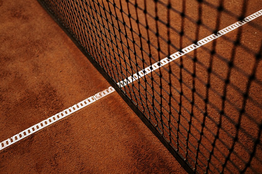 A Lind-Ritzville/Sprague assistant tennis coach has been charged with multiple crimes associated with an alleged inappropriate relationship with a member of the tennis team.