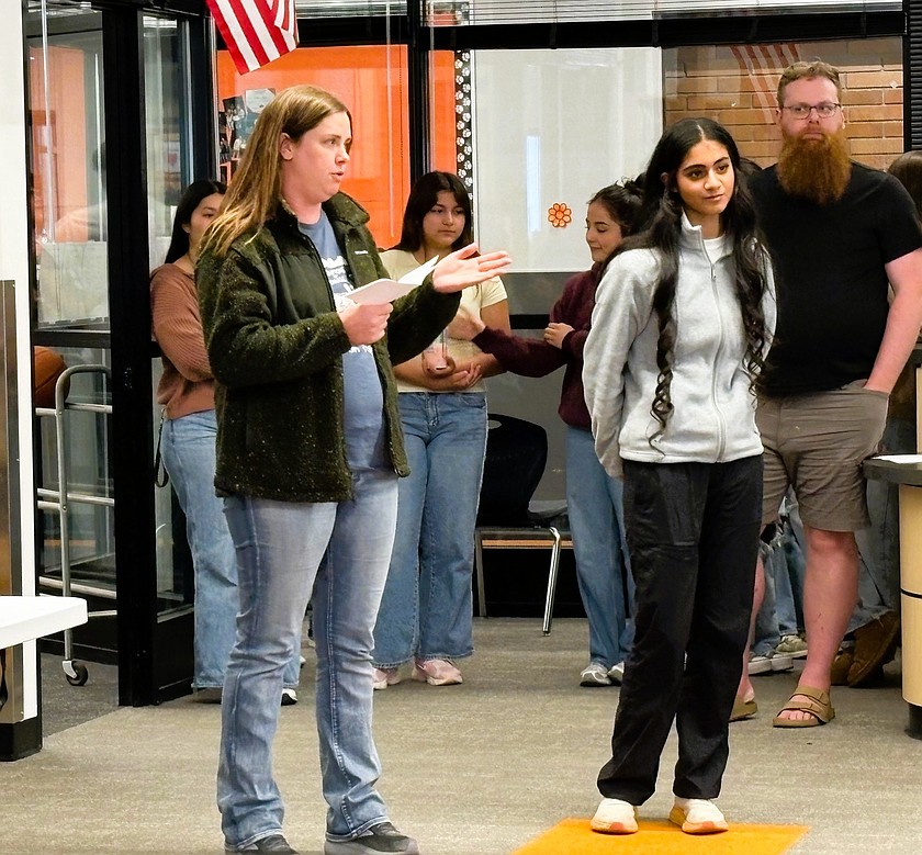 Marissa Cox, left, shares Navi Kaur’s accomplishments at Health Occupations Students of America State Competition with the Ephrata School Board at the March 23 meeting.