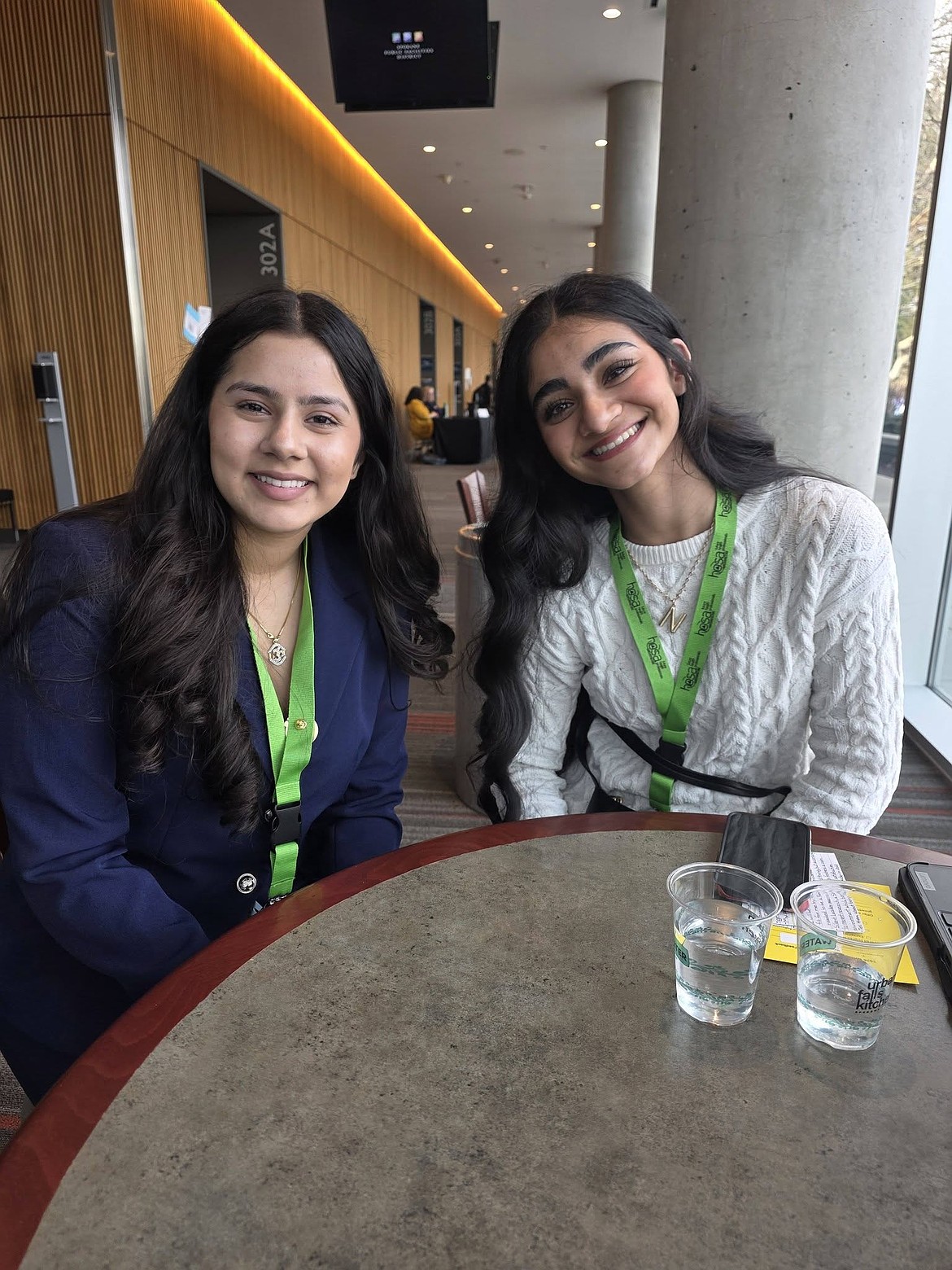 Navi Kaur sits with another student at the Health Occupations Students of America State Competition. Her event focused on family medicine physicians.