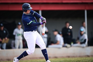 Glacier's Kaeden Kahler (22) drives in two runs with an RBI double in the fifth inning against Belgrade at Griffin Field on Saturday, March 28. (Casey Kreider/Daily Inter Lake)