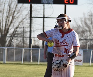 Kenzie Martinez from the Huskies warms up her arm as she gets ready to pitch in game two against the Jacks Thursday afternoon.
