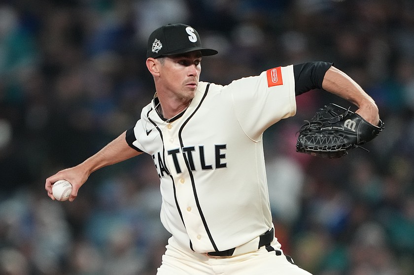 Seattle Mariners starting pitcher Emerson Hancock throws against the Cleveland Guardians during the third inning of a baseball game, Sunday, March 29, 2026, in Seattle. (AP Photo/Lindsey Wasson)