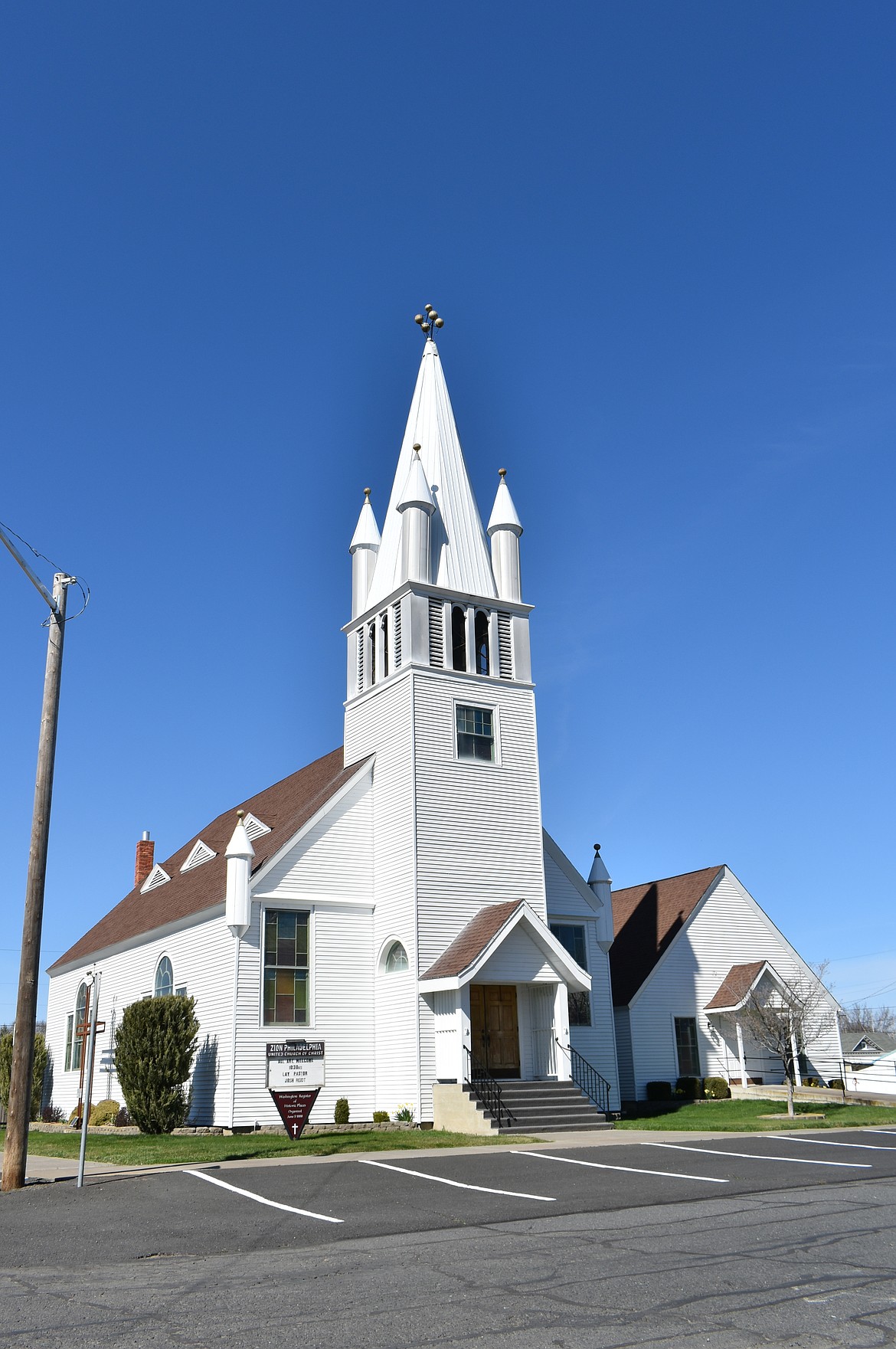 The spire of Zion Philadelphia United Methodist Church rises into a clear blue sky above Ritzville Friday.